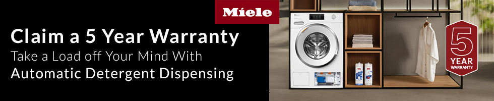 Image of a Miele freestanding washing machine in a laundry room. The text says; Claim a 5 Year Warranty. Take a load off your mind with automatic detergent dispensing.