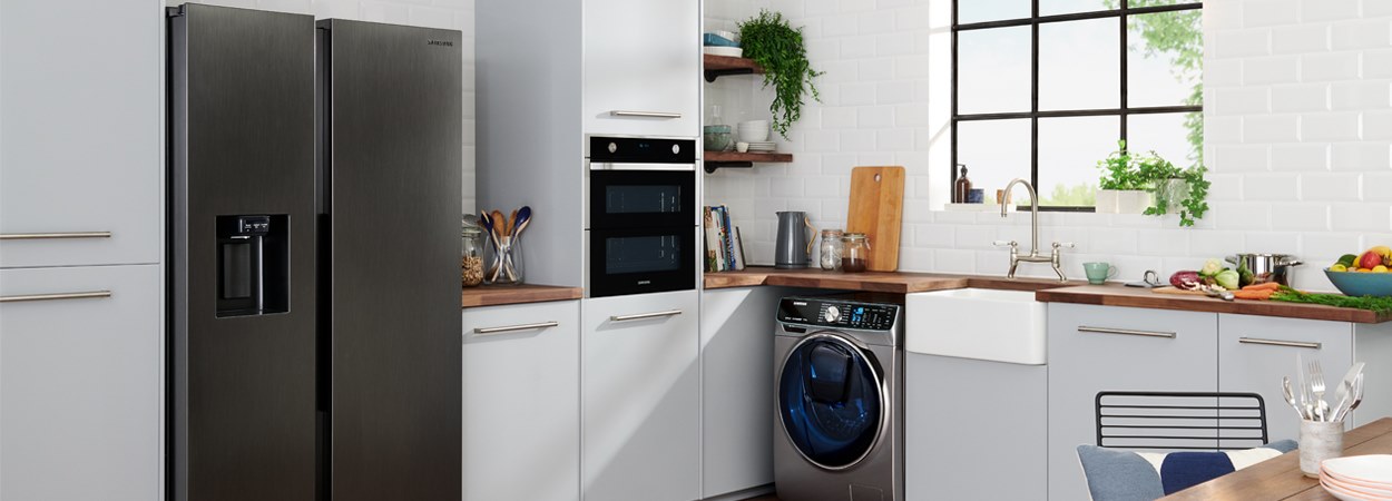 Lifestyle image of a kitchen featuring Samsung appliances